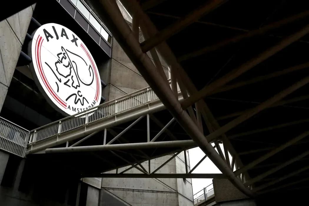 Ajax Amsterdam logo on stadium exterior