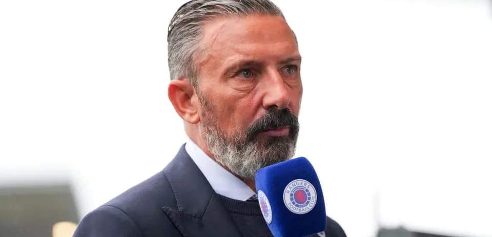 Analyst speaking into microphone during broadcast