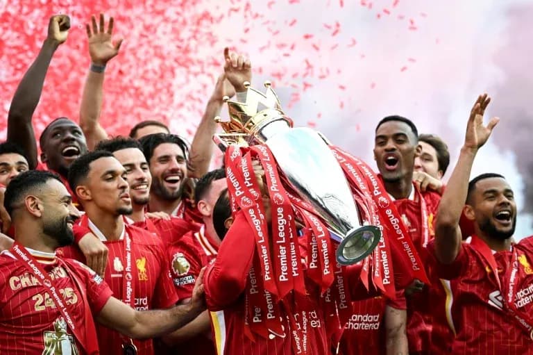 Liverpool players celebrating Premier League trophy win