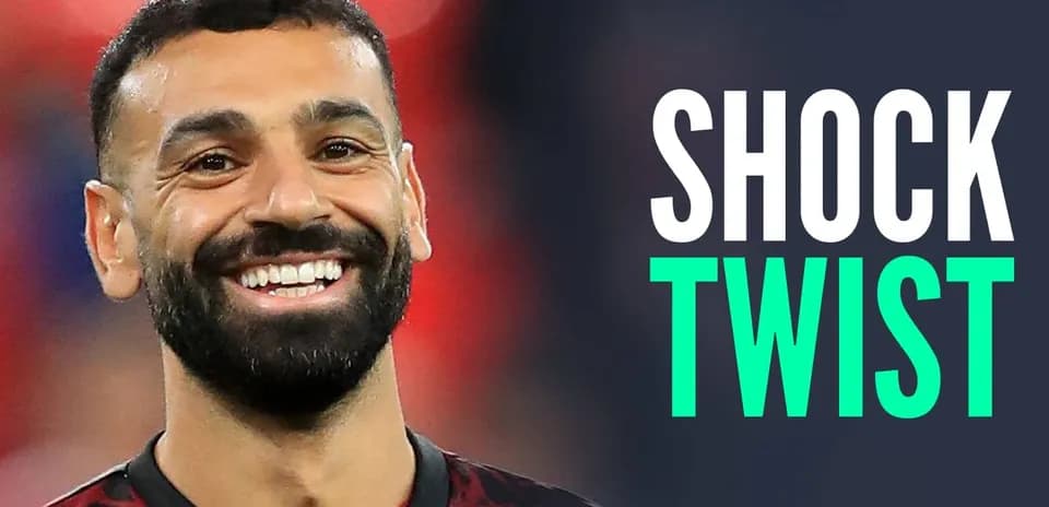 Futbolçu gülərək kamera qarşısında dayanır