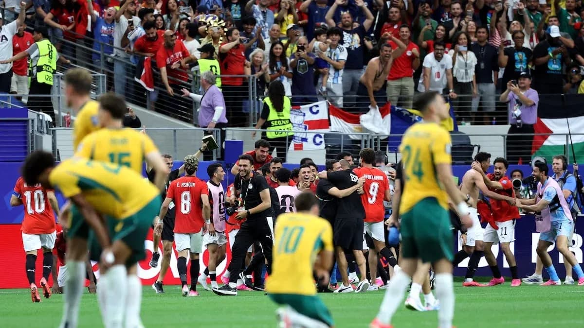 Players celebrating with fans after match conclusion