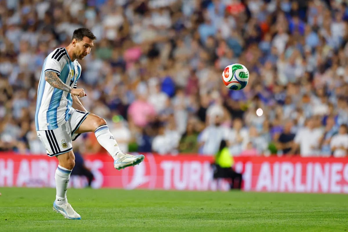 Lionel Messi striking the ball during a match