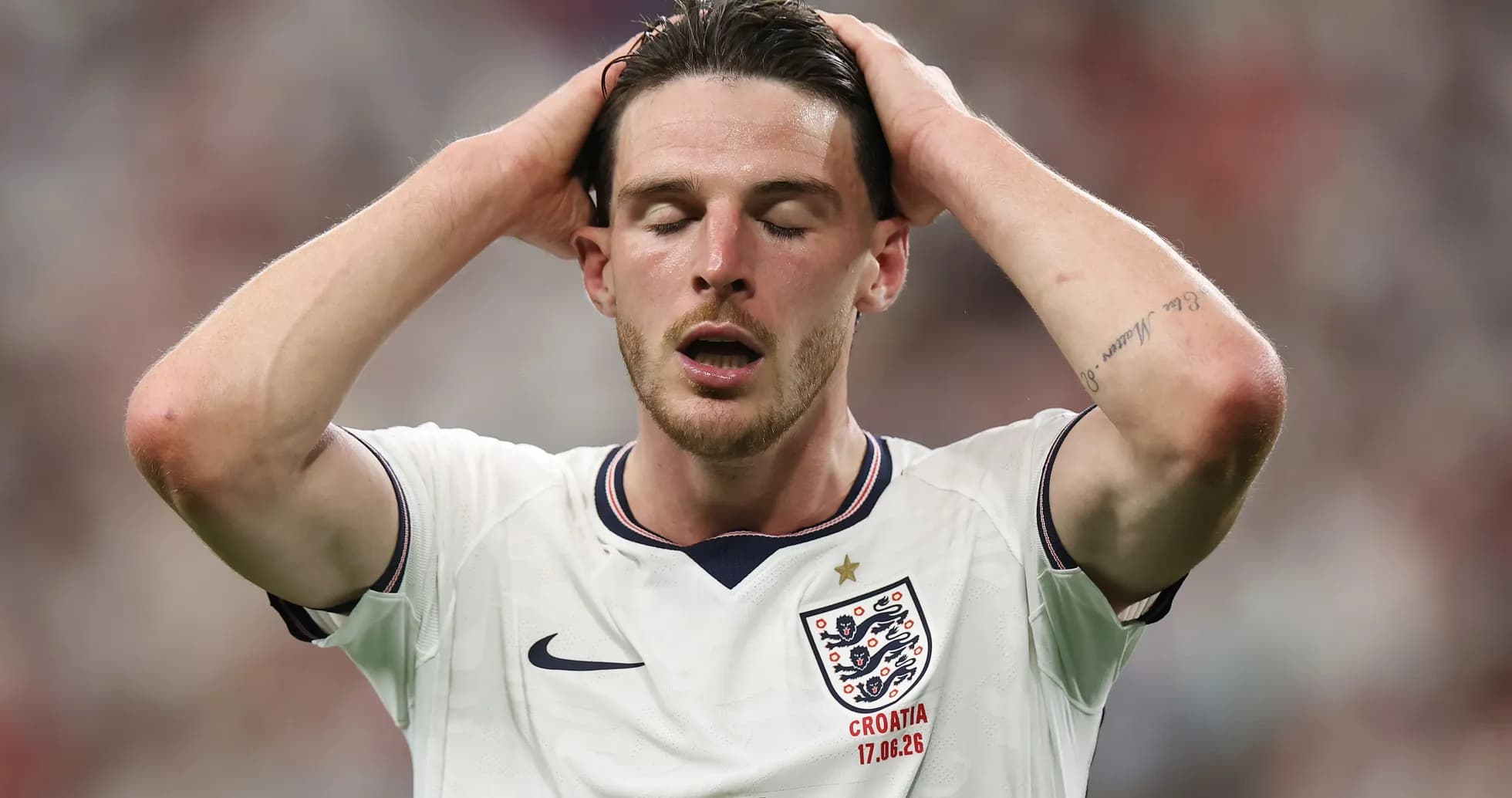 Player holding head in distress during match