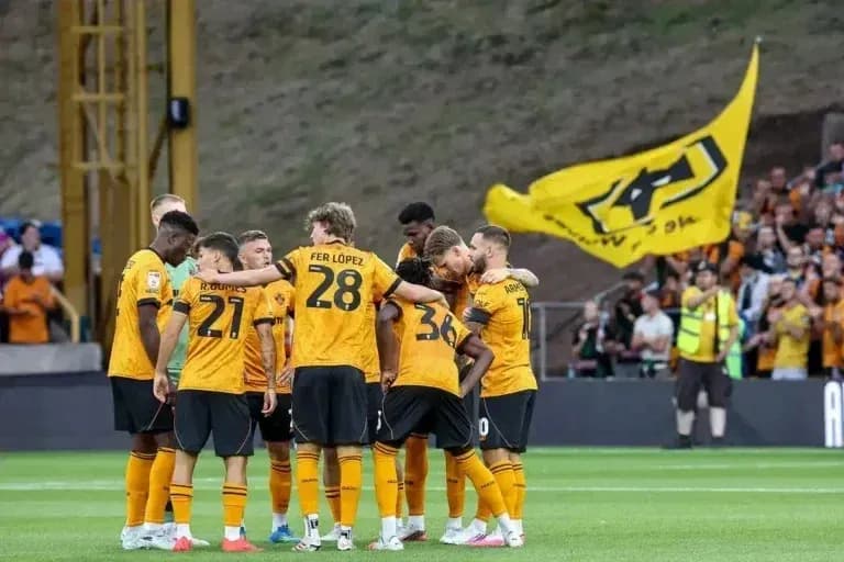Wolverhampton players huddled together before match