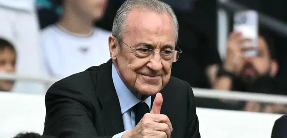 Person giving thumbs up in stadium stands