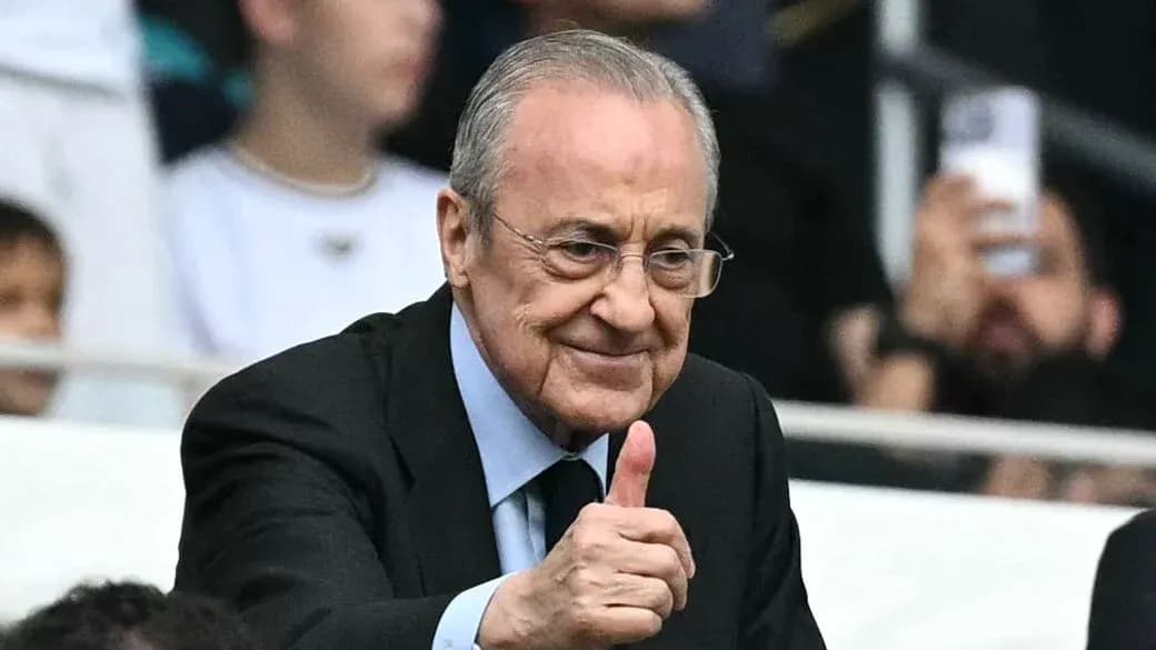 Person giving thumbs up in stadium stands