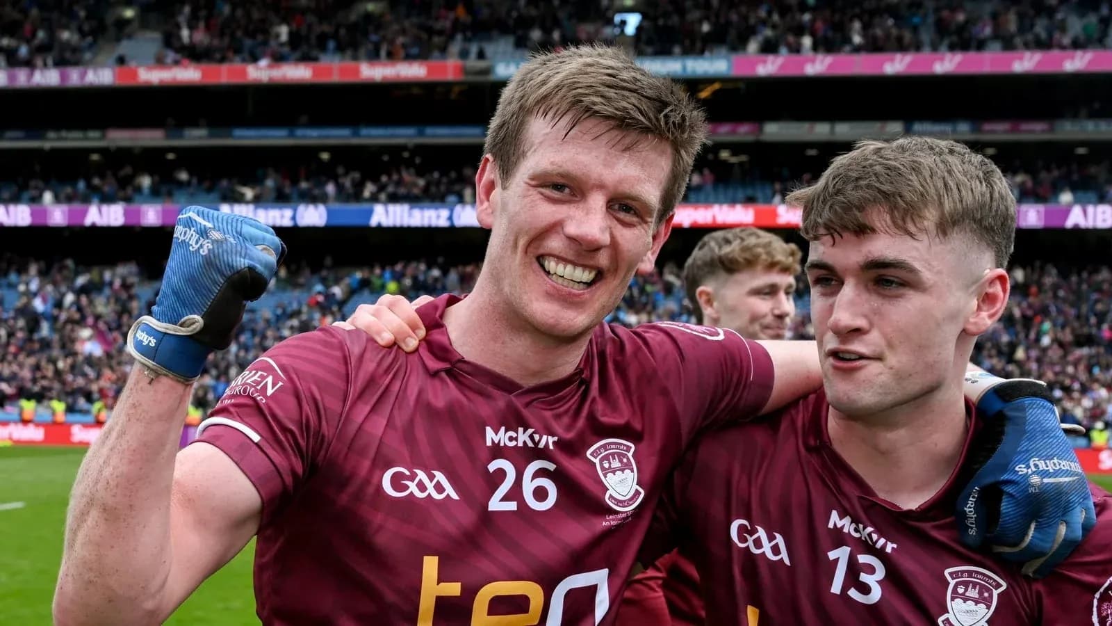 Two players celebrating after a match