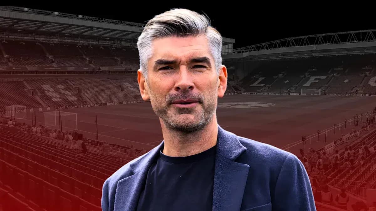 Man in front of football stadium with empty seats