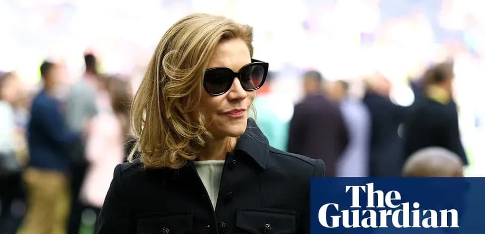 Woman wearing sunglasses at a sporting event