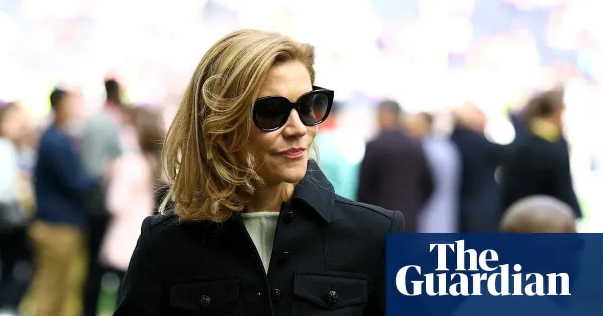 Woman wearing sunglasses at a sporting event