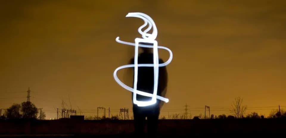 Light drawing of a candle at night