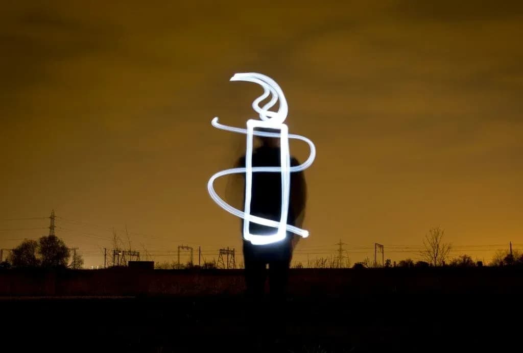 Light drawing of a candle at night