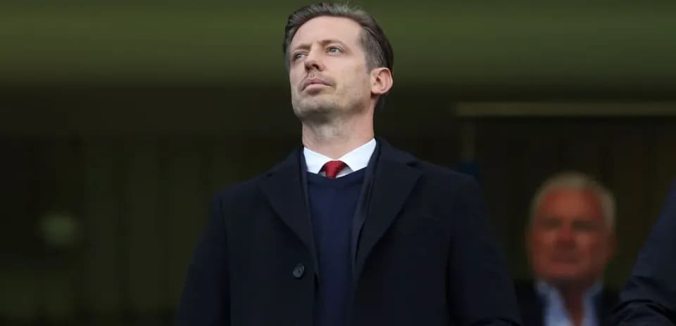 Man observing from the stands during a match