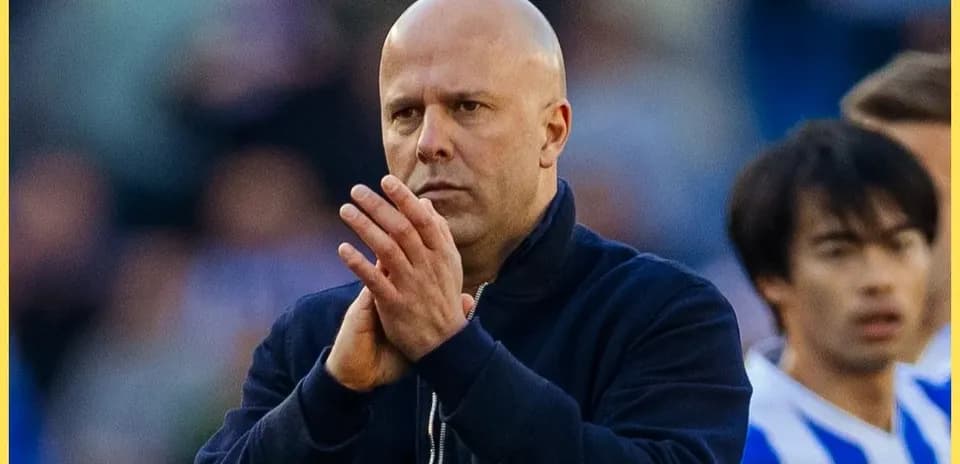 Men's football coach clapping during match