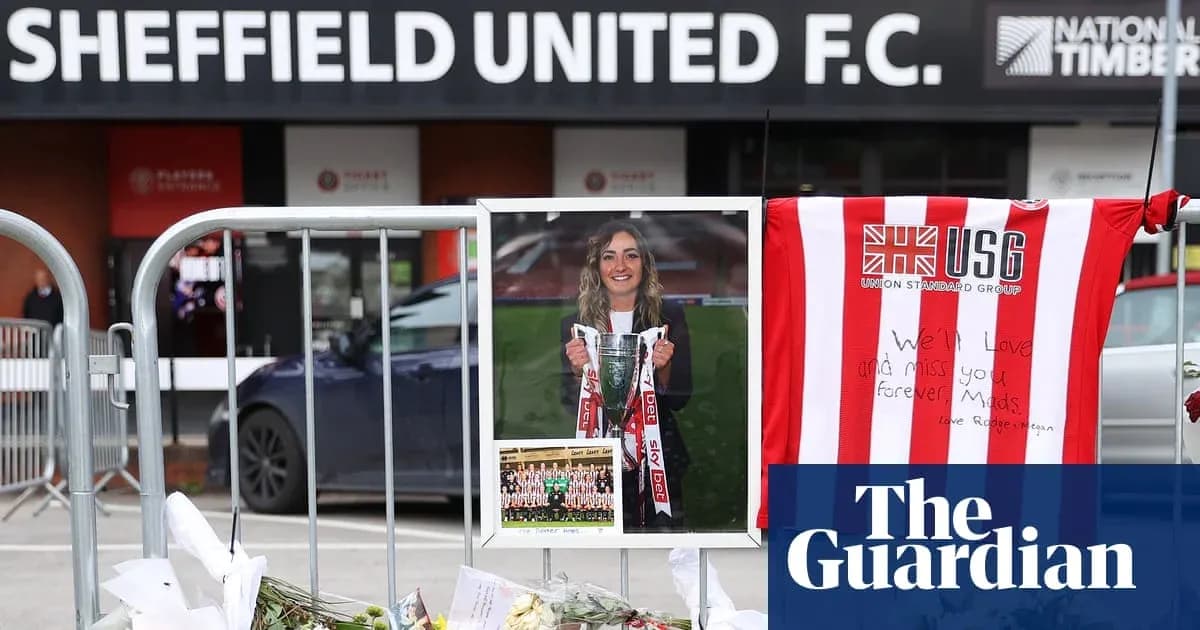 Tributes outside Sheffield United F.C. with flowers and photo