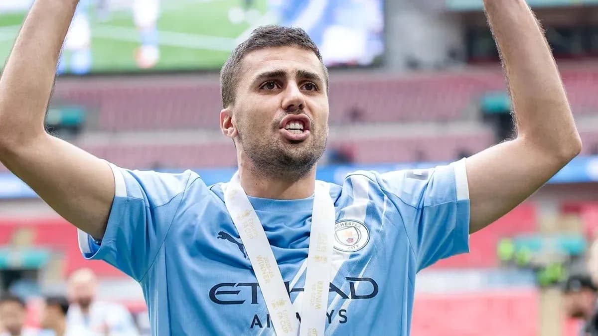 Player celebrating with medal after match victory
