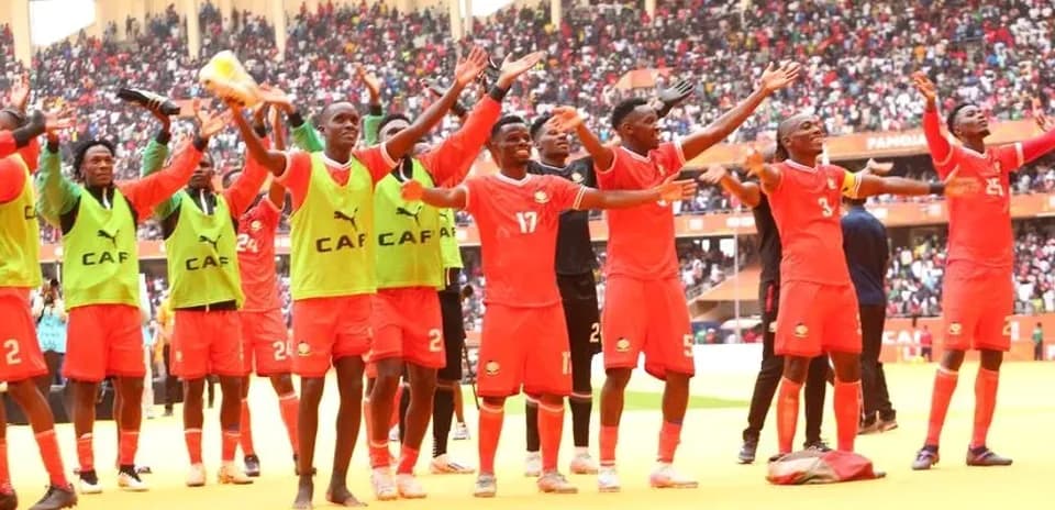 Kenya national team celebrating with fans after match
