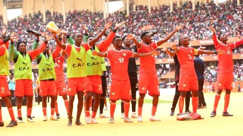 Kenya national team celebrating with fans after match