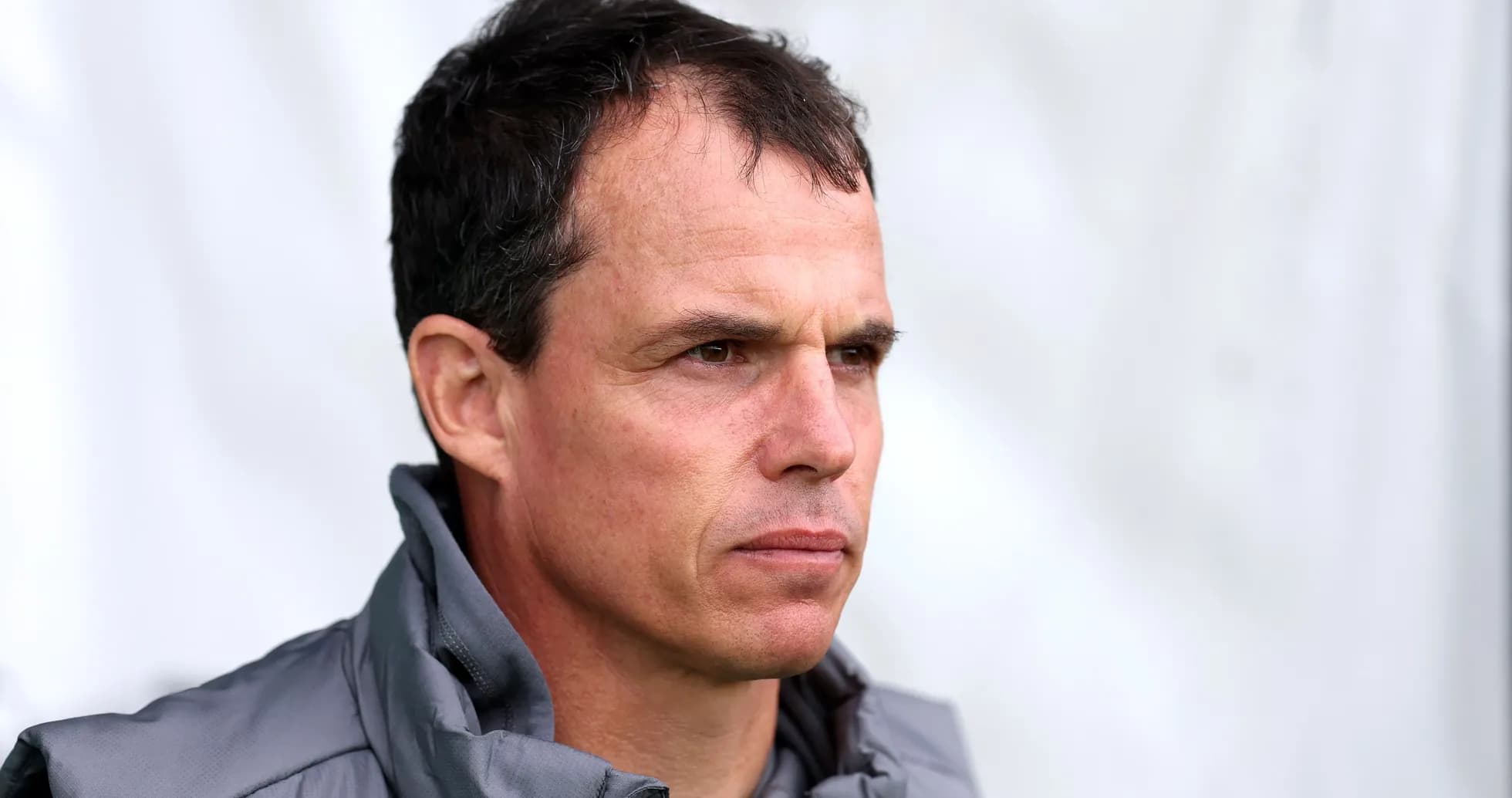 Coach looking focused during training session
