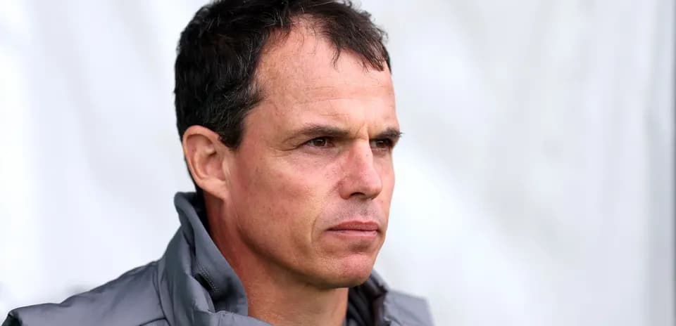 Coach looking focused during training session