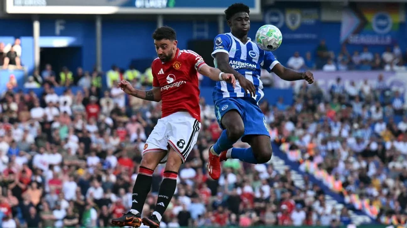 Two players competing for the ball during match