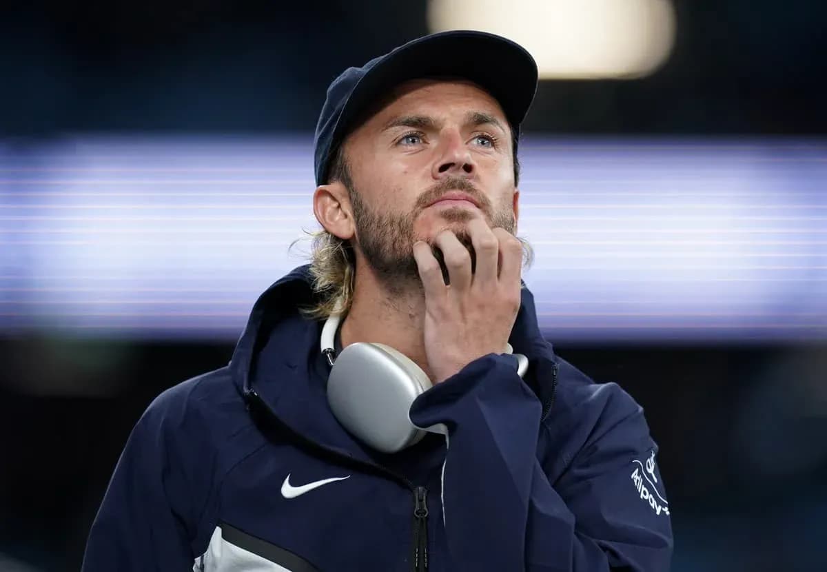 Player pondering during a match at the stadium