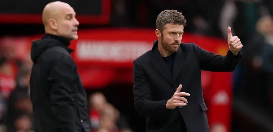 Coaches giving instructions during a football match