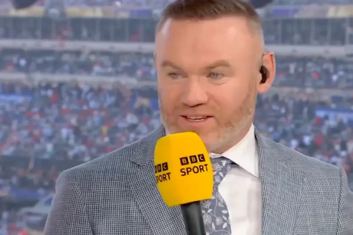 Analyst speaking with microphone during sports broadcast