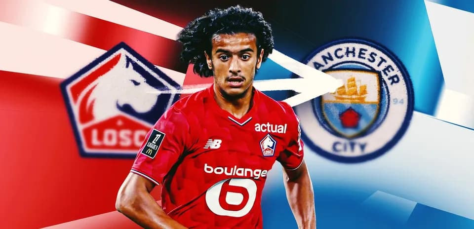 Futbolçu LOSC formasında, Manchester City logosu arxasında