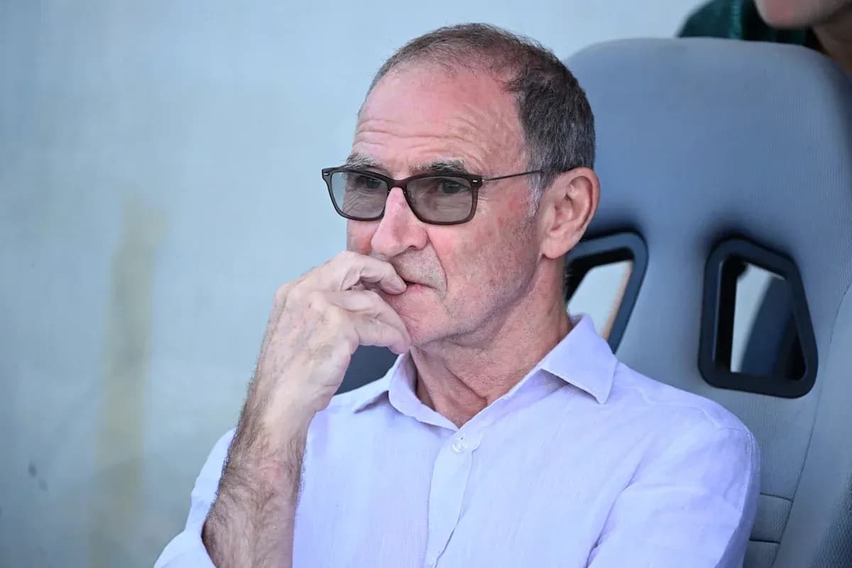Person watching match from the sidelines