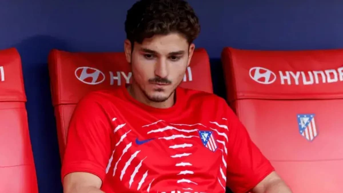 Player sitting on bench during match