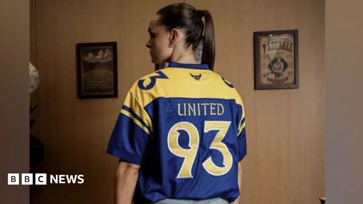 A person wearing a blue and yellow sports jersey A person wearing a blue and yellow sports jersey