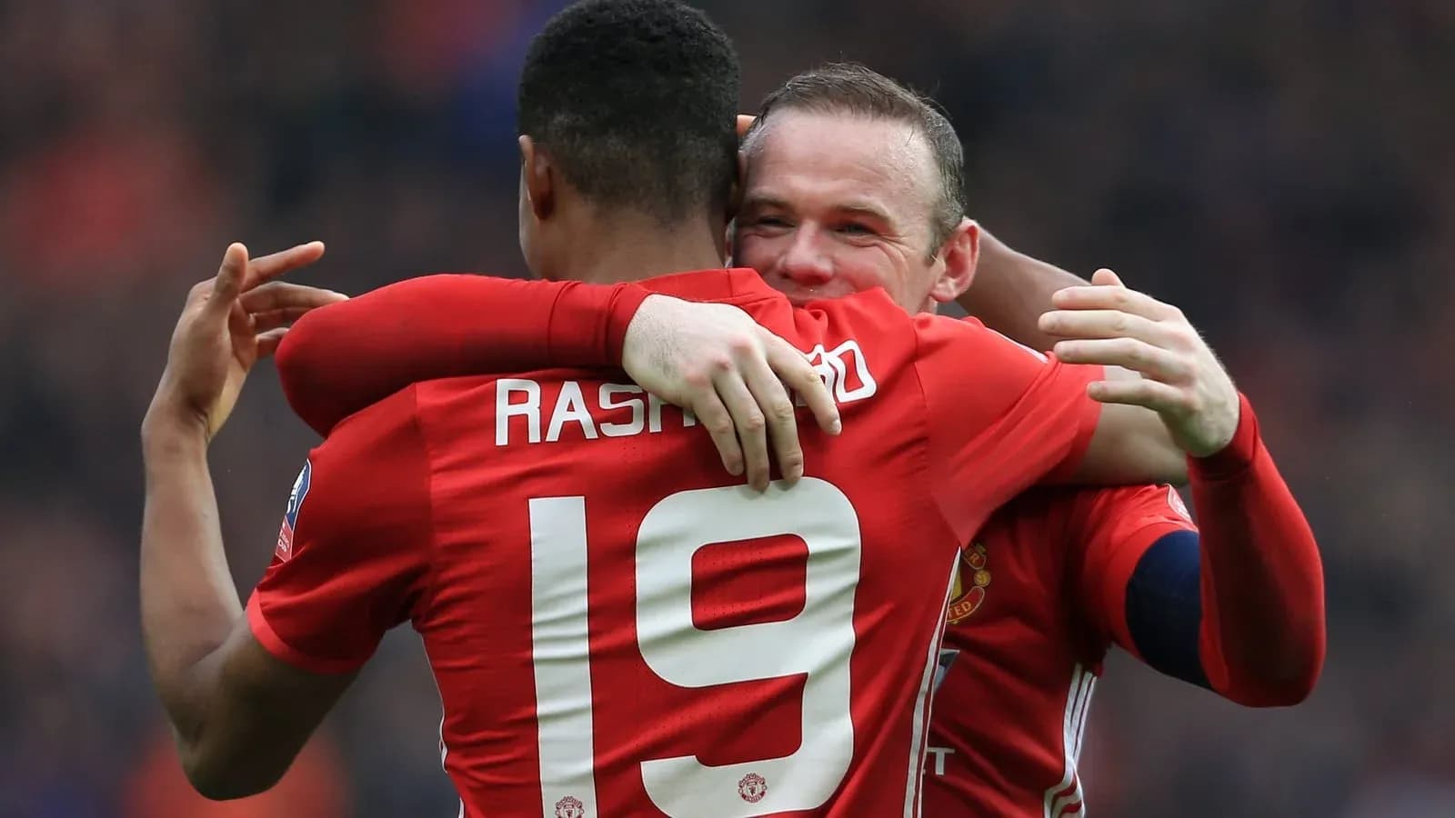 Rashford and Rooney celebrating a goal together Rashford and Rooney celebrating a goal together