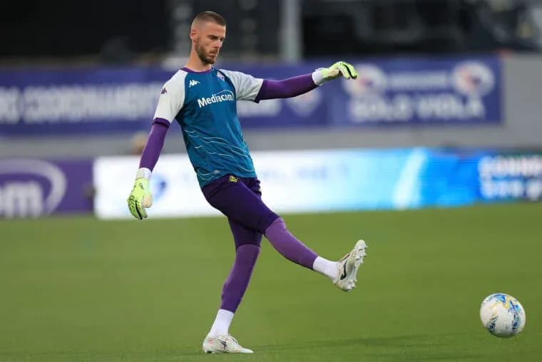 Goalkeeper training by kicking a soccer ball Goalkeeper training by kicking a soccer ball