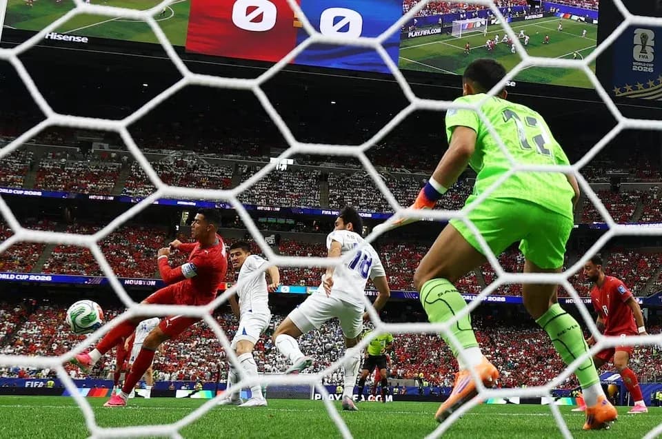 Goalkeeper saving a shot during World Cup match Goalkeeper saving a shot during World Cup match