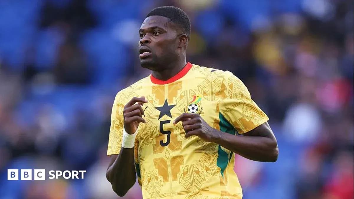 Ghana player wearing yellow jersey during match Ghana player wearing yellow jersey during match
