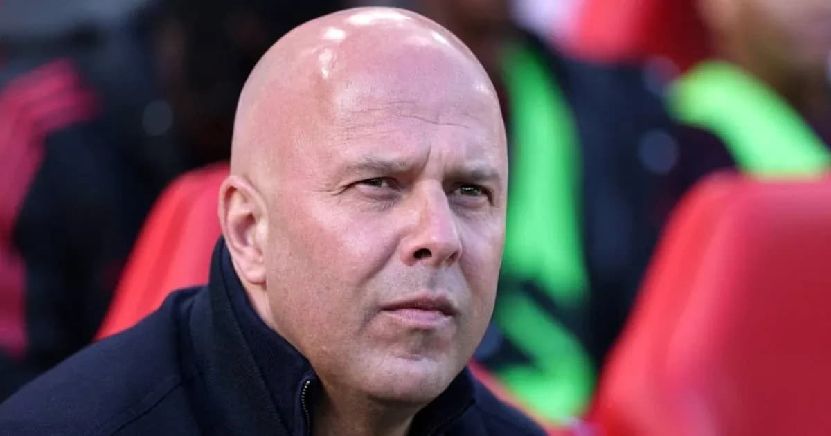 Coach observing from the sidelines during match Coach observing from the sidelines during match