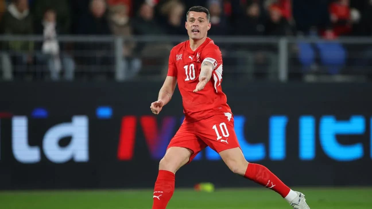 Qətər və İsveçrə matçında futbolçu Qətər və İsveçrə matçında futbolçu