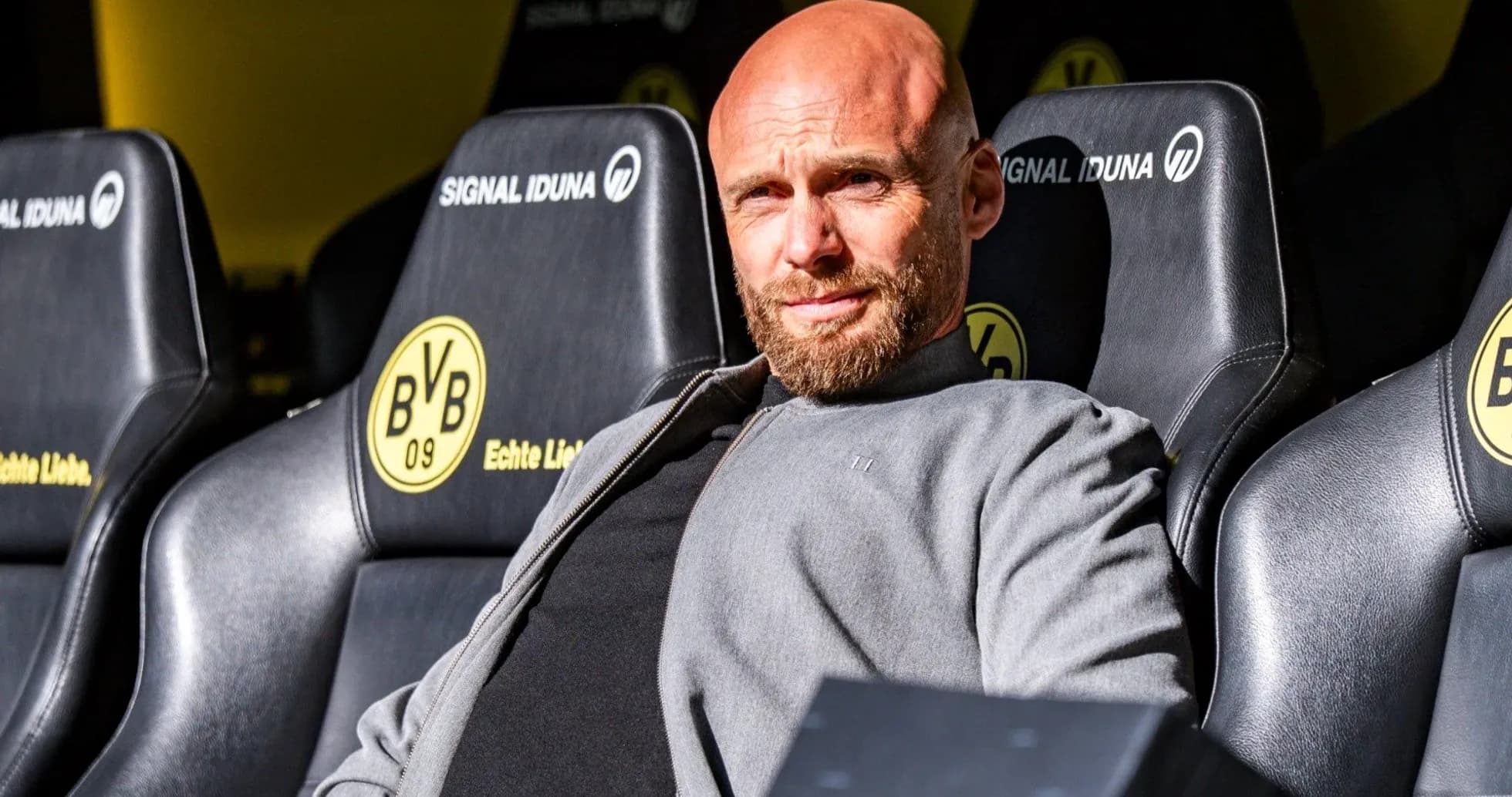 BVB coach seated on the bench during match BVB coach seated on the bench during match