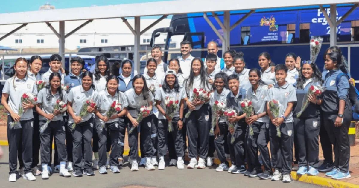 Indian women's football team posing with flowers Indian women's football team posing with flowers