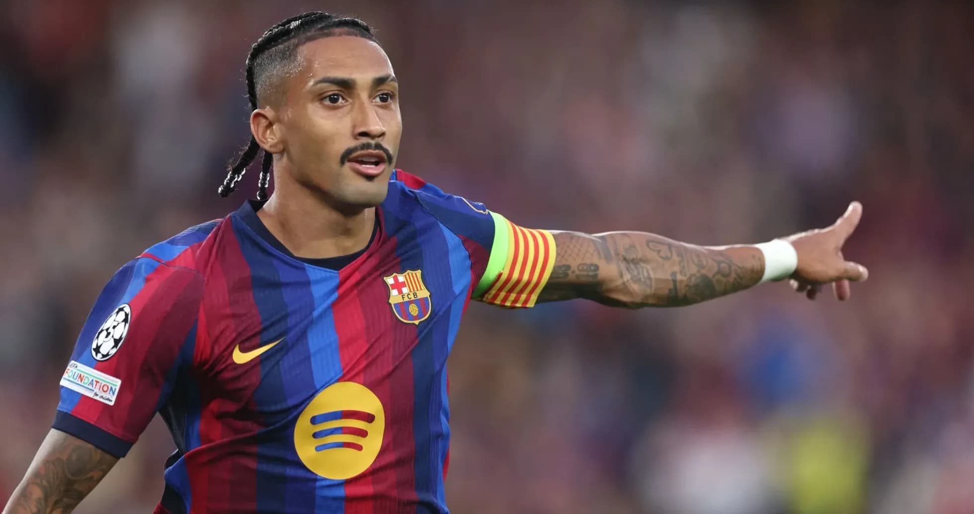 Barcelona player directing teammates during match Barcelona player directing teammates during match