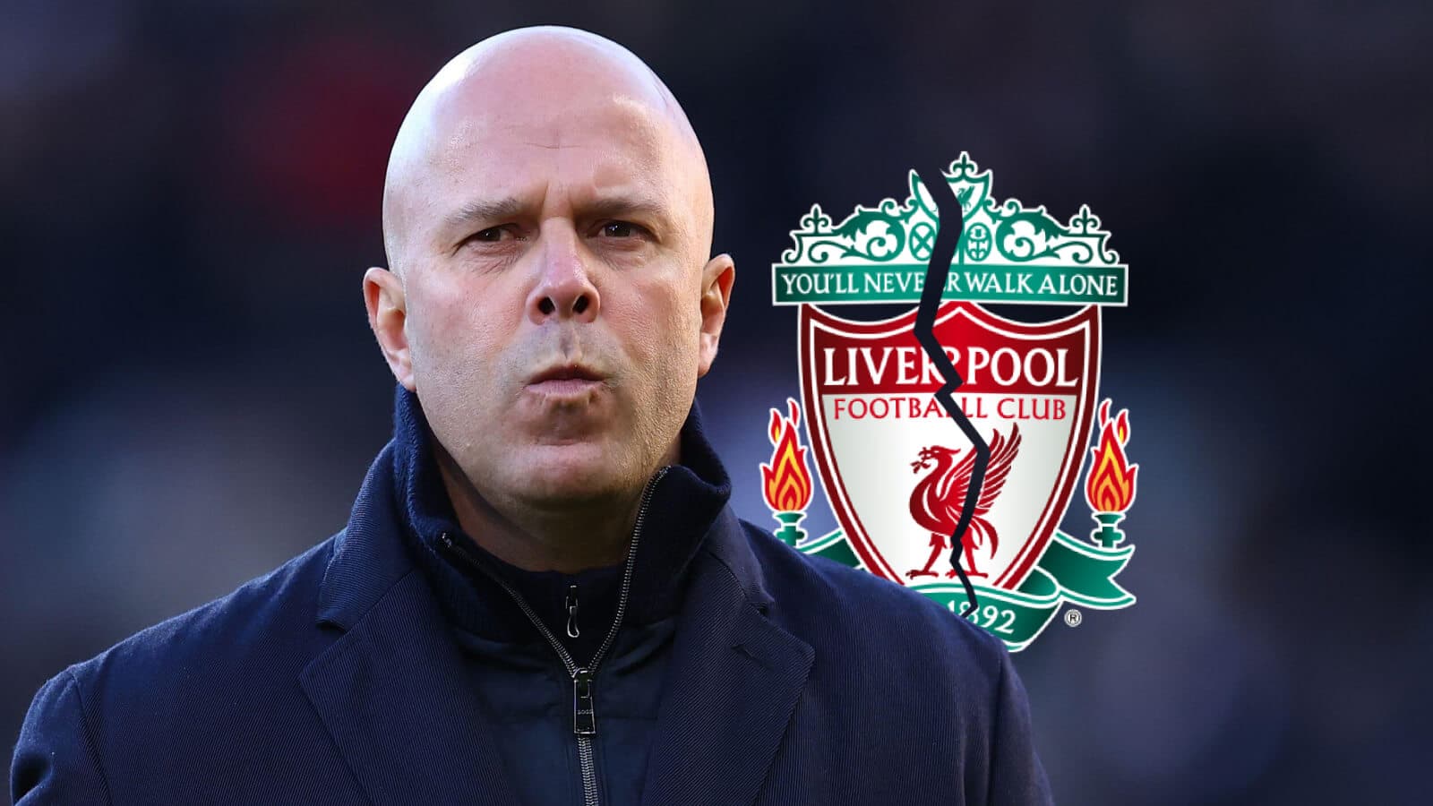 Men's football coach in front of Liverpool logo Men's football coach in front of Liverpool logo