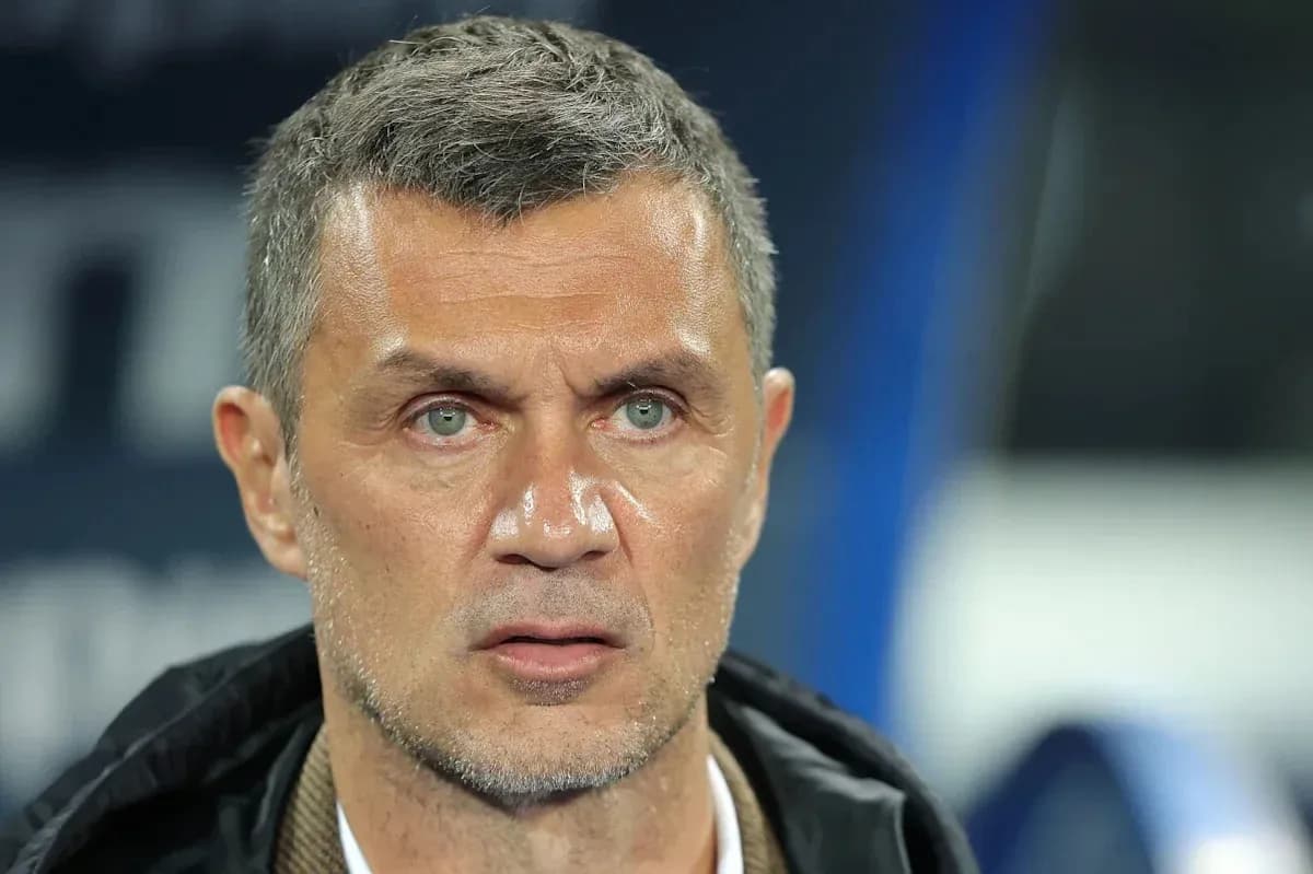 Football manager focused during match observation Football manager focused during match observation