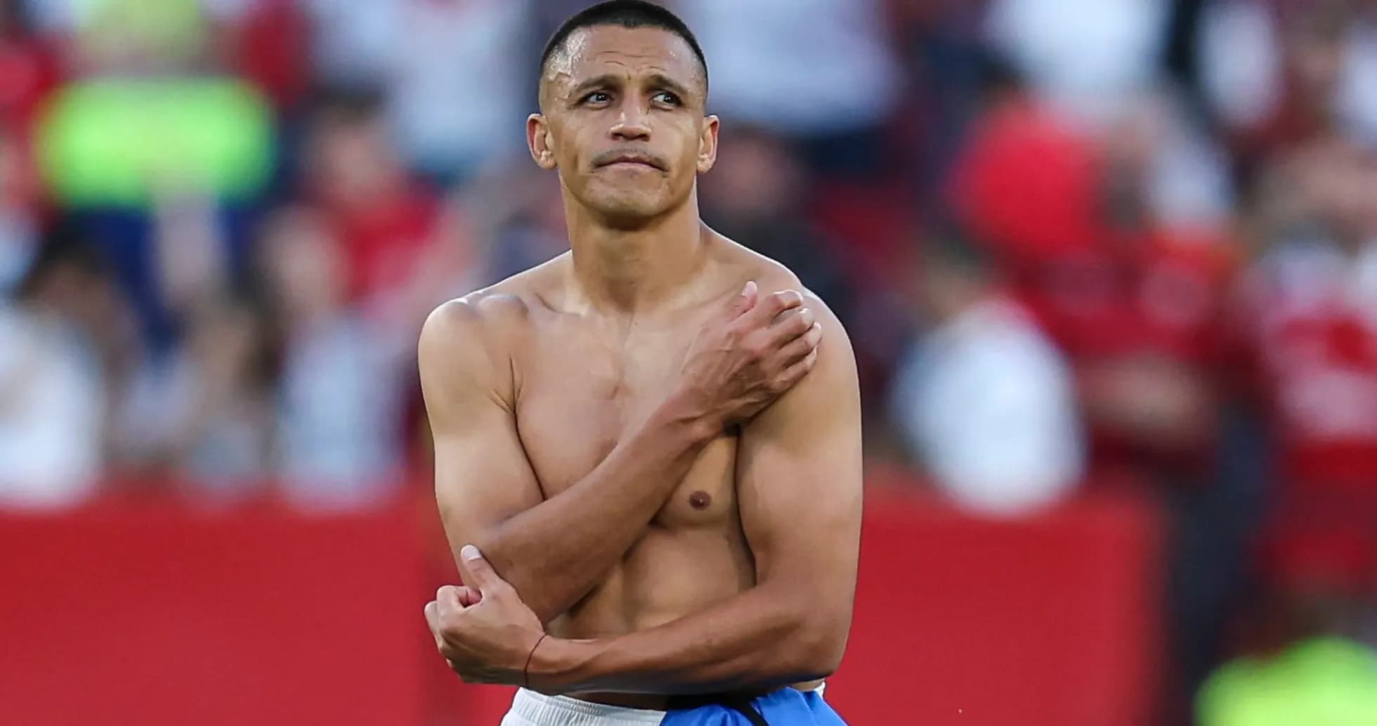 Player with bare torso after a match Player with bare torso after a match