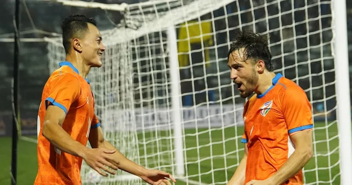Players celebrating a goal on the field Players celebrating a goal on the field