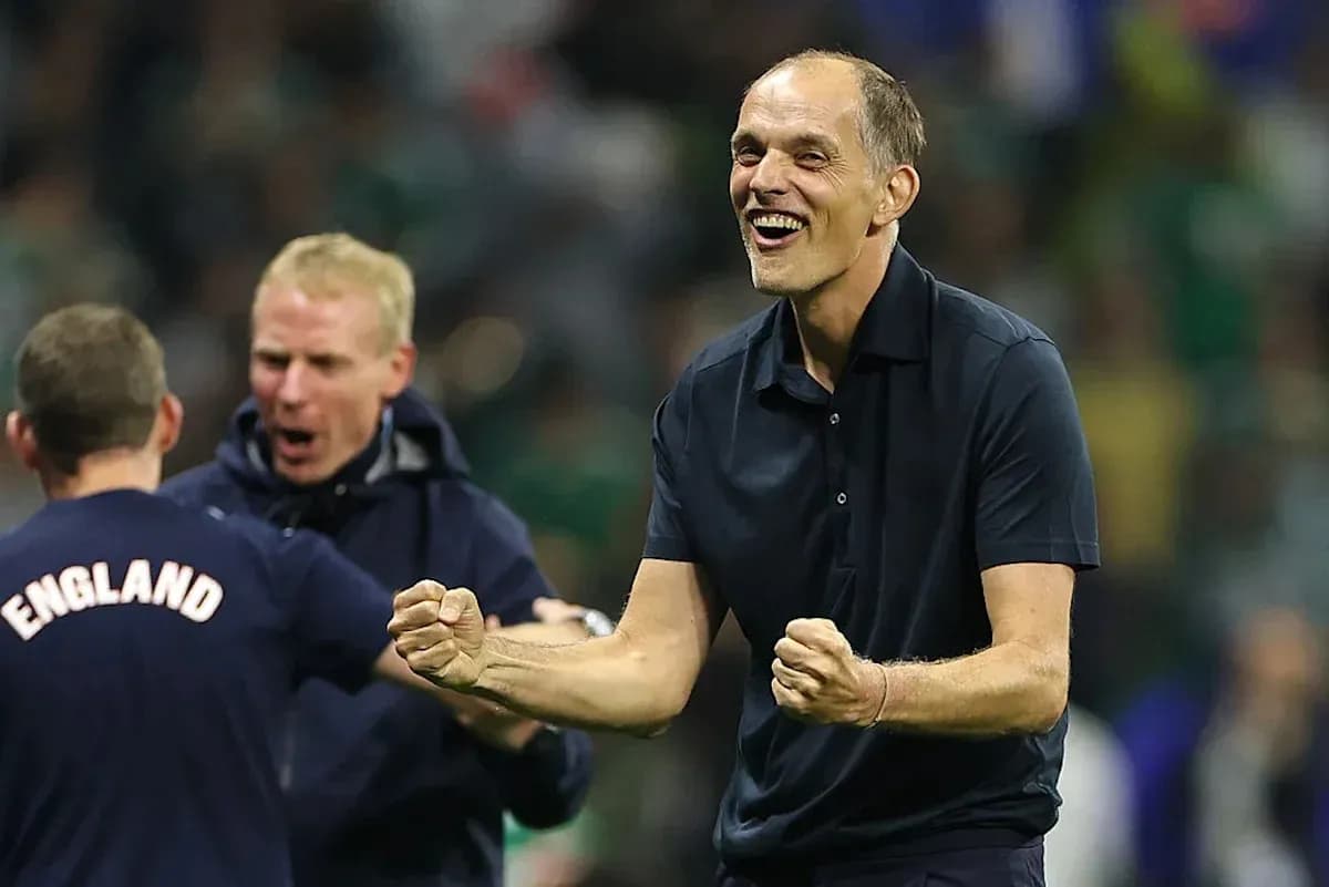 Coach celebrating with staff after a match Coach celebrating with staff after a match