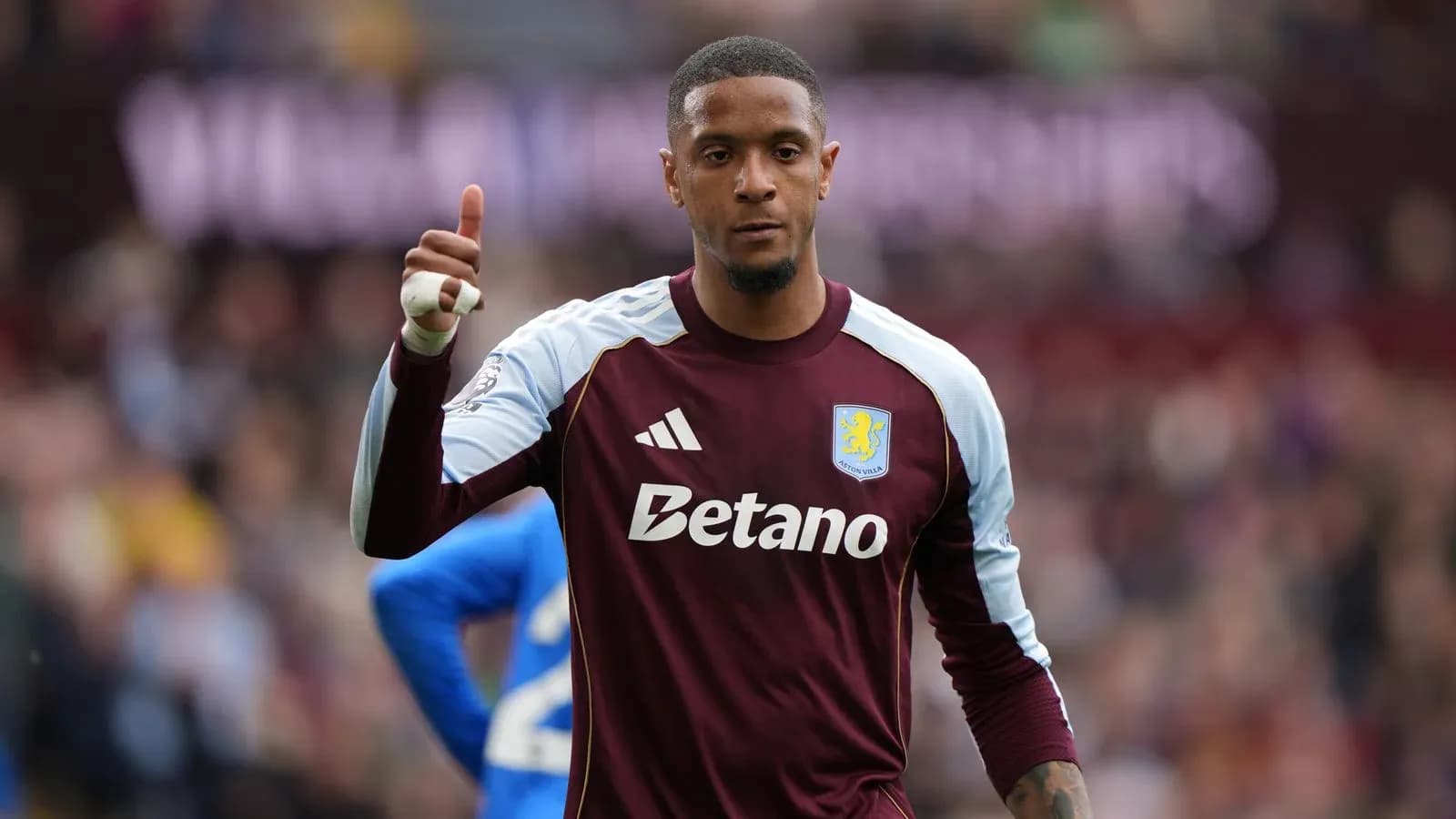 Goalkeeper signaling during match for Aston Villa Goalkeeper signaling during match for Aston Villa