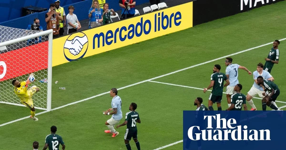 Goalkeeper saving a shot during football match Goalkeeper saving a shot during football match