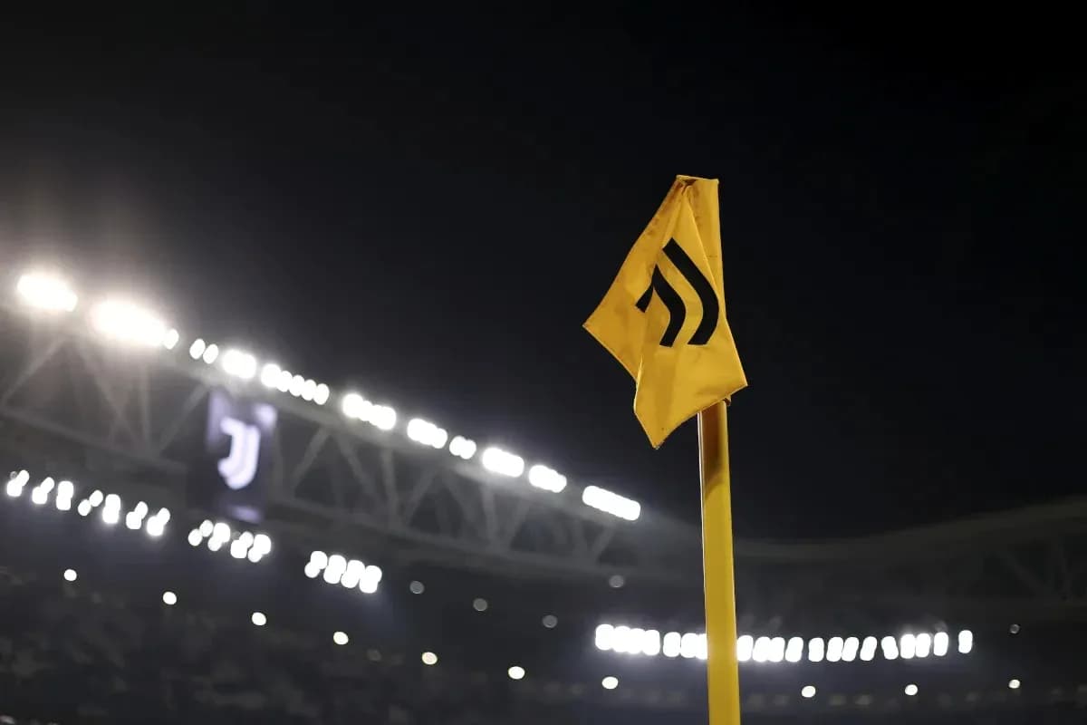 Juventus corner flag at stadium during night Juventus corner flag at stadium during night
