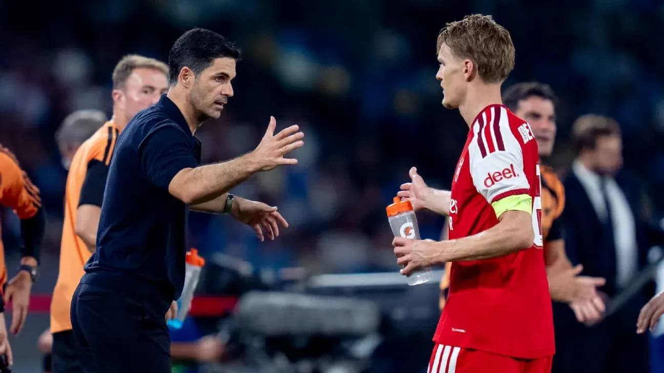 Coach discussing with player during match substitution Coach discussing with player during match substitution